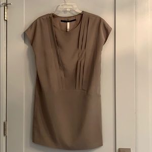 Modern style mini dress with pleating detail.!